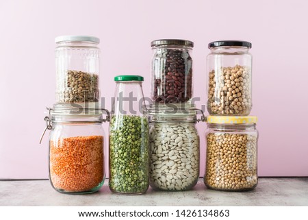 Variety of legumes in glass jars. Zero waste storage concept Royalty-Free Stock Photo #1426134863