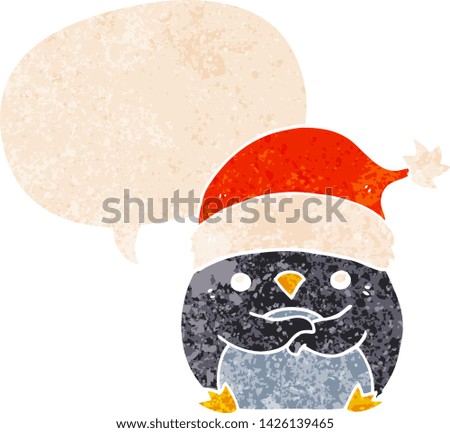 cute cartoon penguin wearing christmas hat with speech bubble in grunge distressed retro textured style