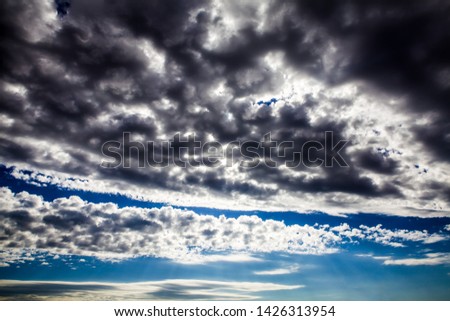 Dramatic Cloudscape Background with a Blue Sky