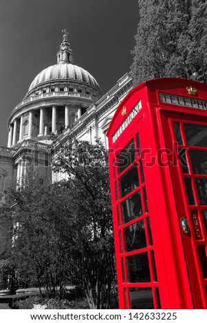 Image of St Paul's Cathedral, London, England with a red phone box in the foreground