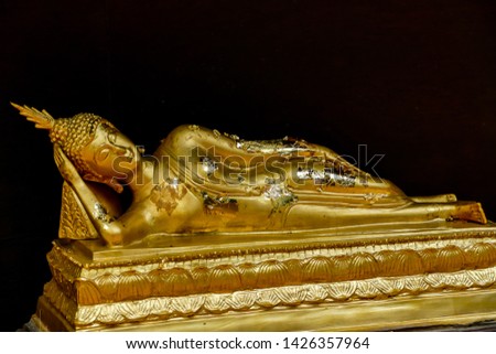golden statue of buddha, digital photo picture as a background