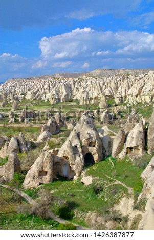 The photo was taken in Turkey in the spring. The picture shows the ancient cave dwellings in the mountains of Cappadocia.