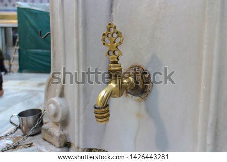Turkish Ottoman style water tap at the ablution fountain in front of Eyup Sultan Mosque