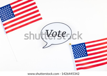 Creative top view flat lay of American flags for Elections Memorial Day 4th of July or Labour Day with bubble lightbox copy space white background minimal style. Concept of patriotism and independence