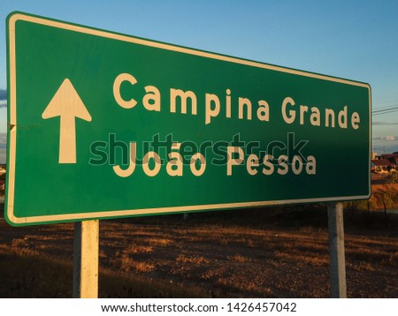 Approximate image of a green transit board next to a Brazilian highway, BR 230, near the municipality of Soledade, Paraíba, Brazil. Royalty-Free Stock Photo #1426457042