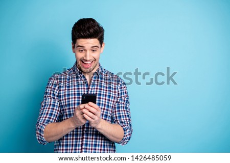 Close-up photo portrait of excited cheerful rejoicing ecstatic positive humorous follower finding funny picture of friend on instagram network isolated pastel background
