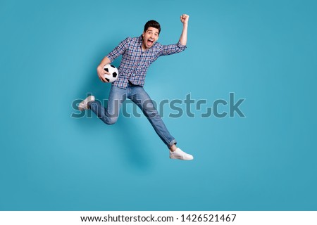 Full length body size view photo ecstatic lucky person raise fists shout yeah celebrate goal entertainment wow checked modern stylish trendy denim outfit sneakers free time isolated blue background