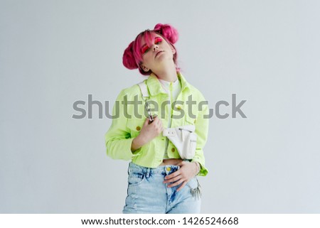 woman in stylish trendy clothes with pink hair