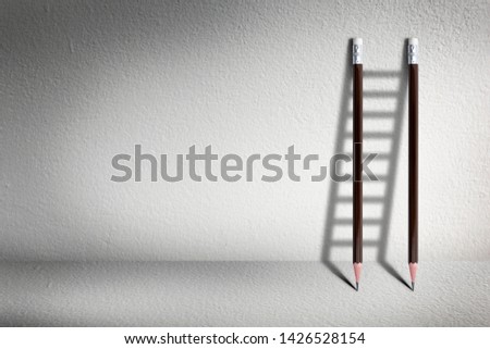 Stairs with pencil for effort and challenge in business to be achievement and successful concept.
 Royalty-Free Stock Photo #1426528154