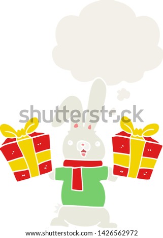 cartoon rabbit with christmas presents with thought bubble in retro style