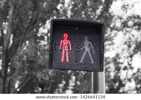 close-up of a red traffic light for pedestrians