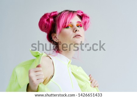 serious woman with pink hair portrait