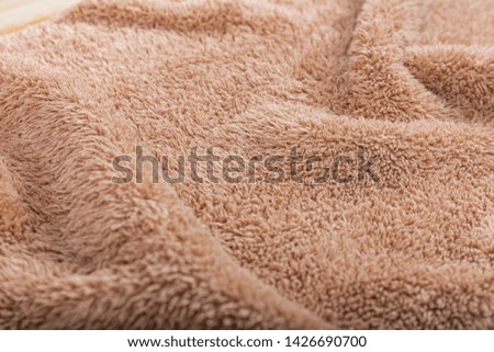 The texture background of the brown towel