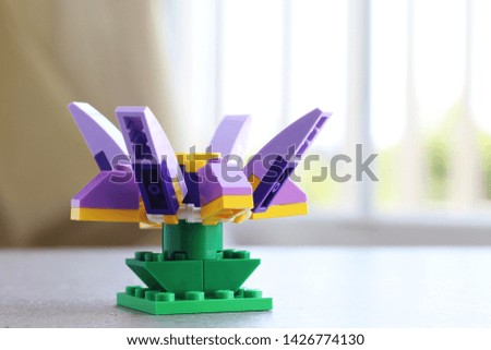 Toy flower designed from toy construction set.