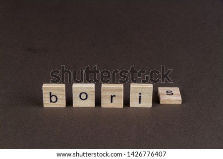 Boris in children letter blocks, S tipped over, suggesting downfall of Boris. Royalty-Free Stock Photo #1426776407