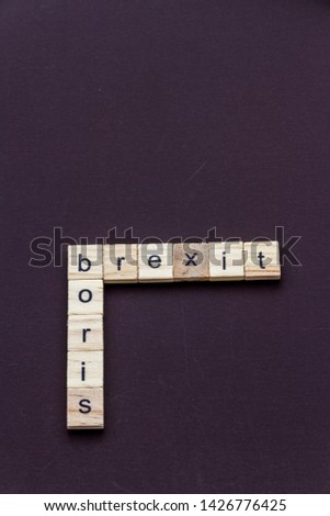 Boris and Brexit, like a crossword, in children letter blocks, portrait, copyspace Royalty-Free Stock Photo #1426776425