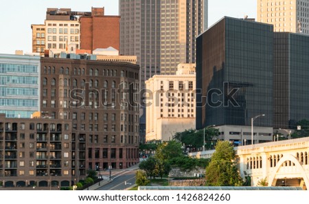 Downtown Cleveland Ohio Architecture And Urban Buildings With Bridge Along The Cuyahoga River. A Very Popular Tourist Destination And Top 10 Place To Visit.