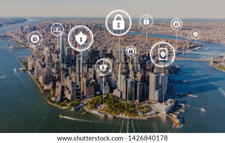 Cyber security theme with aerial view of Manhattan, NY skyline