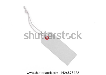 Blank tag tied with string. Price tag, gift tag, sale tag, address label isolated on the white background.