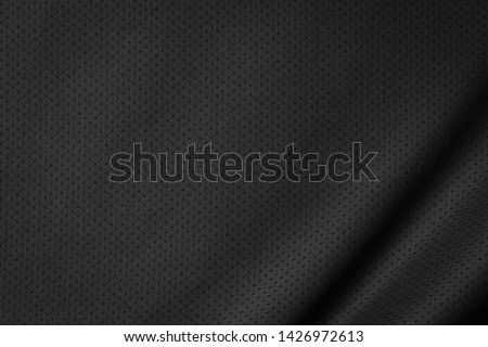 Black jersey texture background. Detail of luxury fabric surface. Royalty-Free Stock Photo #1426972613