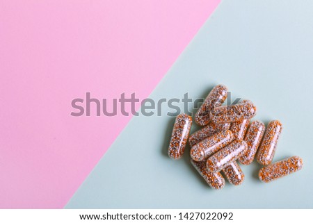 Close up vitamins and supplements on white background