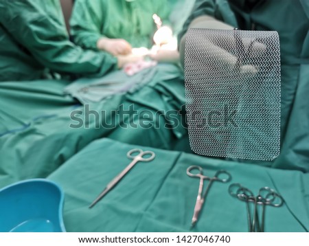 Synthetic Mesh that being used for Inguinal Hernia Repair under aseptic technique. Royalty-Free Stock Photo #1427046740