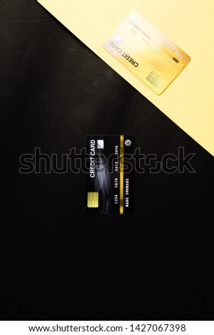 Collection of  credit card isolated over black and yellow background