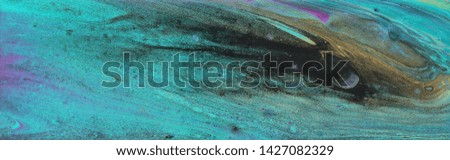 photography of abstract marbleized effect background. black, turquoise and white creative colors. Beautiful paint. banner