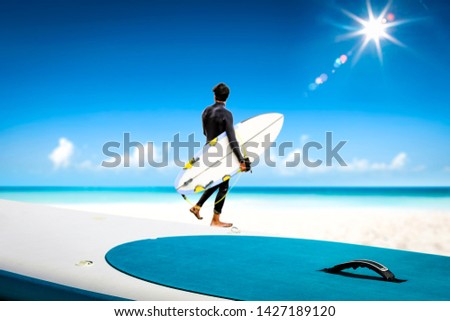 Summer beach background and surfer desk. Free space for your decoration and sunny day. 