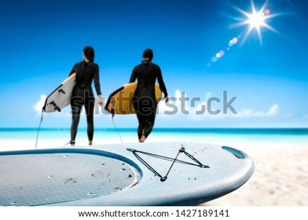 Summer beach background and surfer desk. Free space for your decoration and sunny day. 