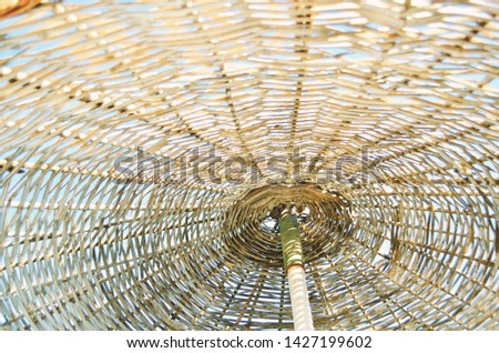 Close up of a straw parasol. Summer conсept. - Image