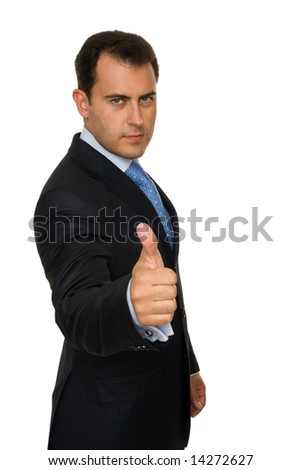 Portrait of a young attractive businessman giving the thumbs-up sign