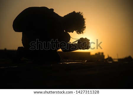 a model photographer during sunset  
