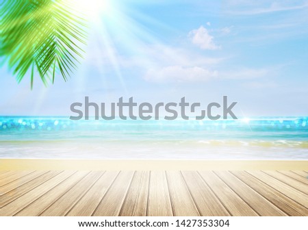Summer sea with dazzling sunburst background