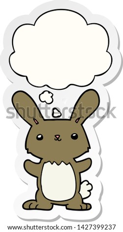 cute cartoon rabbit with thought bubble as a printed sticker