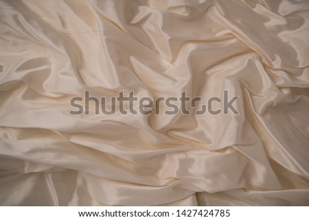 Background image of crumpled pink fabric