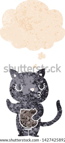 cute cartoon cat with thought bubble in grunge distressed retro textured style