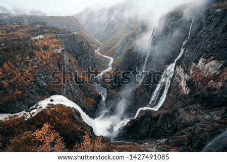 Voringsfossen waterfall at Norway in a foggy weather
