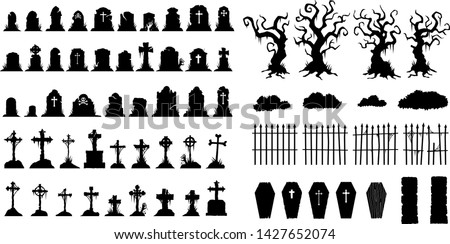 Creepy Halloween Graveyard Headstones Coffins Trees Fences Zombies silhouettes Royalty-Free Stock Photo #1427652074