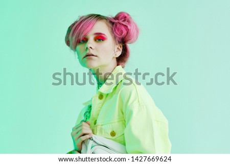 woman with pink hair fashion neon retro style