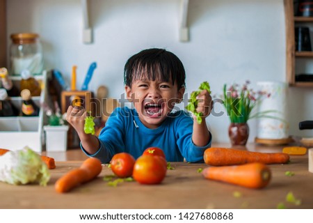 The boy who shows an angry emotion, the concept of emotion of a violent child Royalty-Free Stock Photo #1427680868