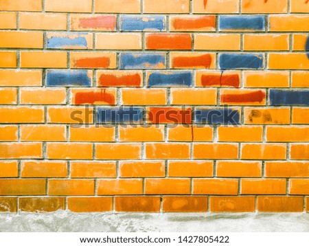 Red dirty brick wall and cement background texture Wallpaper