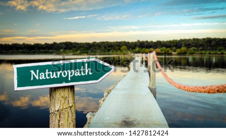 Street Sign the Direction Way to Naturopath Royalty-Free Stock Photo #1427812424