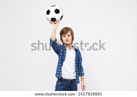 Football fan kid boy in blue t-shirt cheer up support favorite team with soccer ball isolated on white wall background children studio portrait. People childhood lifestyle concept. Mock up copy space
