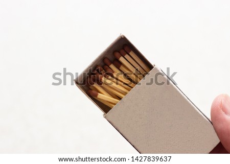 outdoor matchboxes closeup on white background