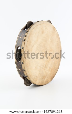 Daf is a large circle cymbals drum that is popular and used in classical music. The frame is usually made of hardwood with numerous metal notches attached