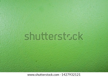 Green yellow wall background, rugged wall