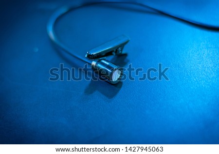 Lapel microphone with cable and clip