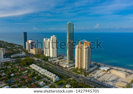 Aerial photo Armani Casa luxury beachfront skyscraper in Sunny Isles Beach Florida