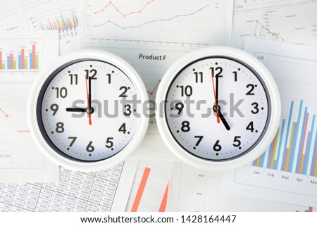 Business concepts, clock indicating working time Royalty-Free Stock Photo #1428164447